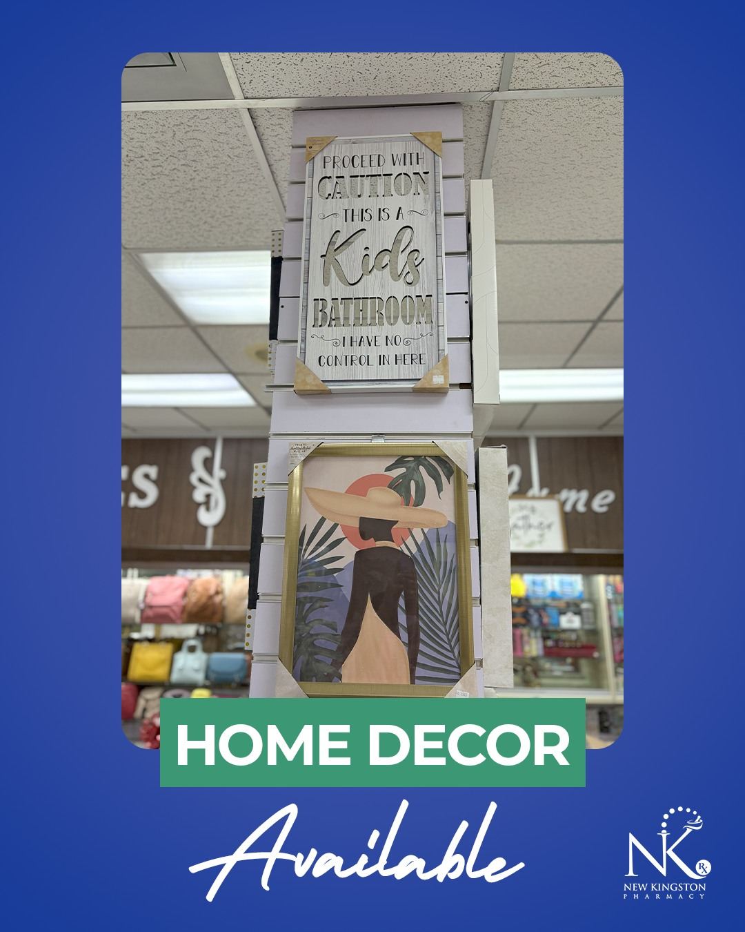 Home decor display in-store, including a framed wall sign and illustrated art print