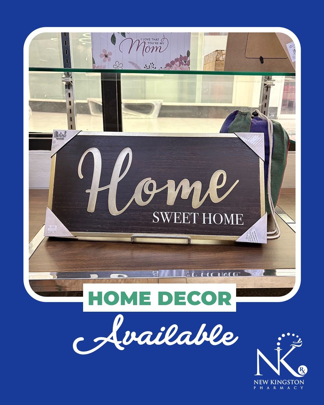Home decor display at New Kingston Pharmacy, featuring a "Home Sweet Home" sign